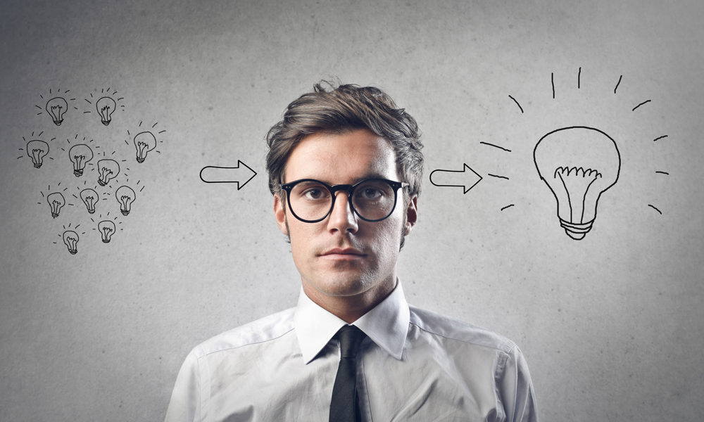 man narrowing ideas down to one